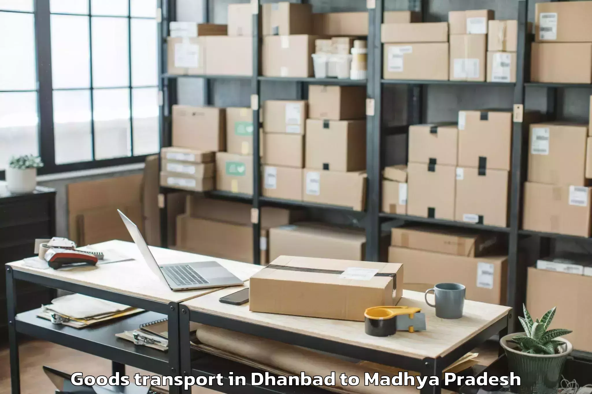 Book Dhanbad to Mahaarajpur Goods Transport